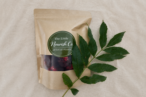 Pouch lying flat on a subtly smoothed earthy background